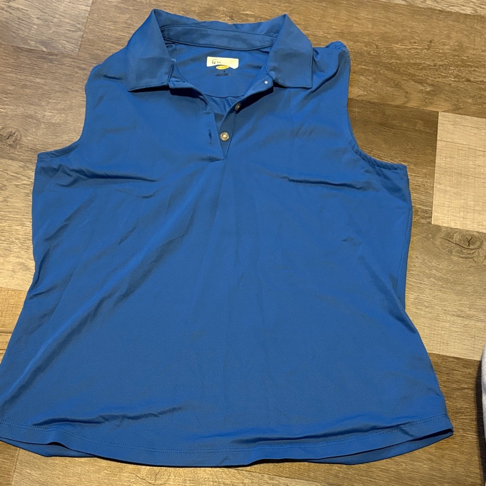 Women's Greg Norman Blue Sleeveless golf top